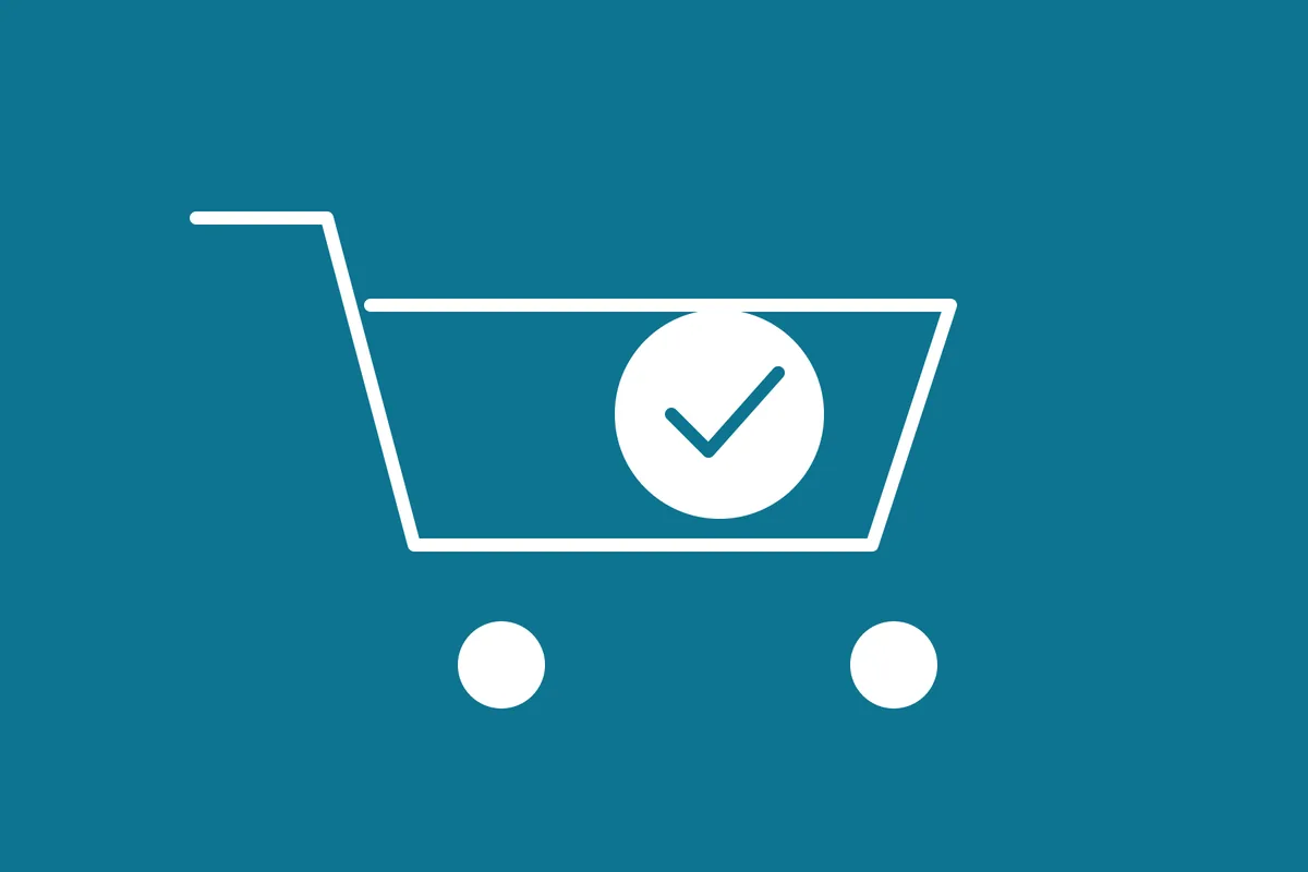 Shopping cart with a checkmark representing a smooth e-commerce checkout